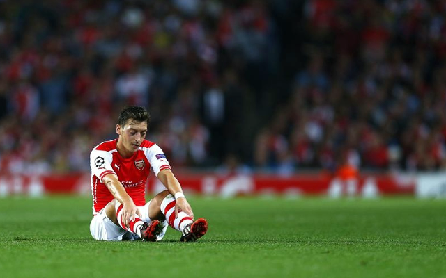 Mesut Ozil claims his knee injury is down to working too hard